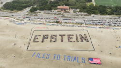 Banner of bodies on S.F.’s Ocean Beach sends Trump a pointed birthday warning