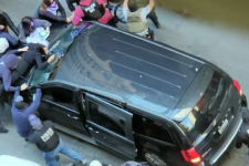 Protesters cling to departing ICE van after arrest at S.F. immigration court