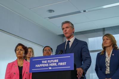 newsomCOVER_Sam Clayton_Staff